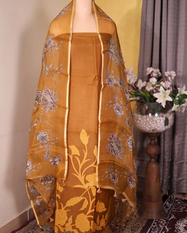 Grace yourself in Mustard this summer in Pure Organza Suit that speaks Quiet Luxury