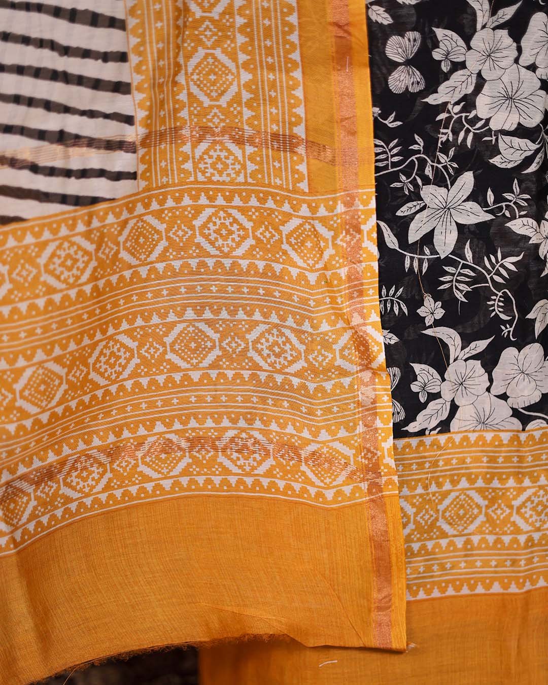 Second image of Yellow Maheshwari Silk Floral Suit with Leheriya Dupatta