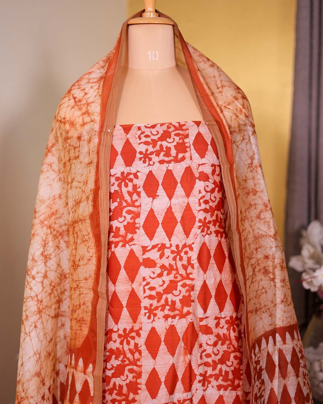Second image of Rust Batik Print Suit with Coordinated Dupatta