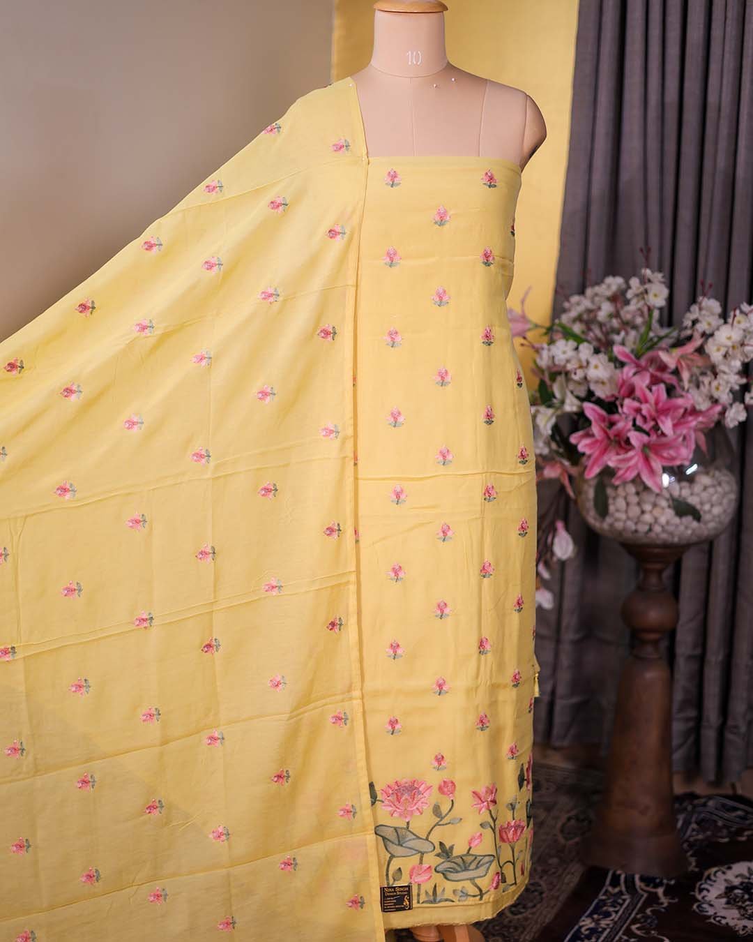Yellow Mal Chanderi Suit with Floral Bootis & Embroidered Hemline