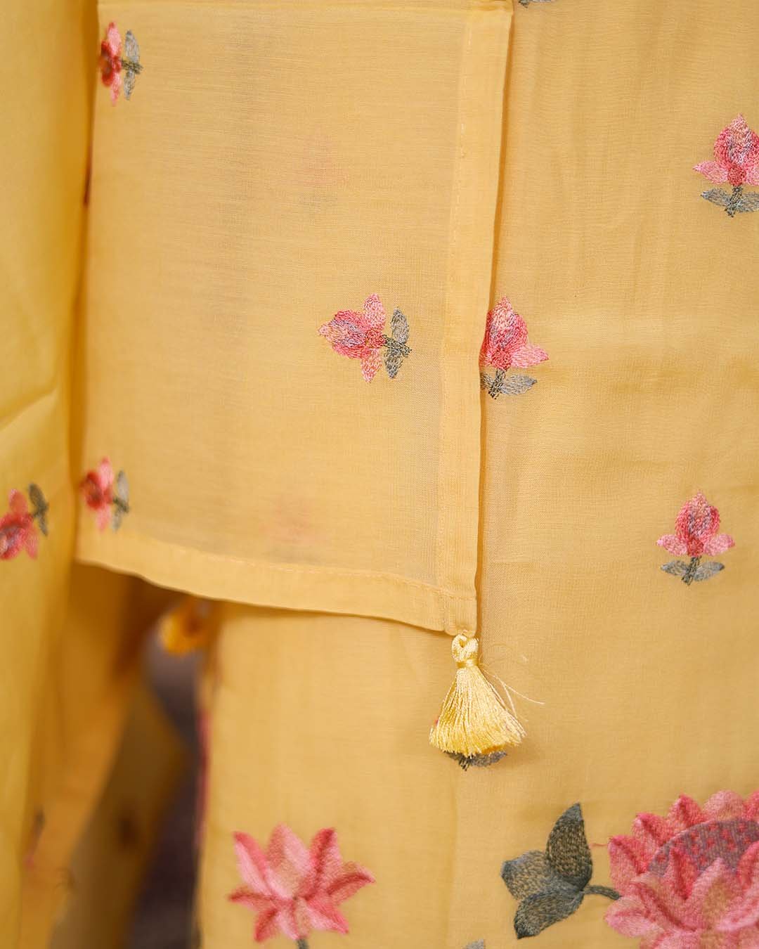 Second image of Yellow Mal Chanderi Suit with Floral Bootis & Embroidered Hemline