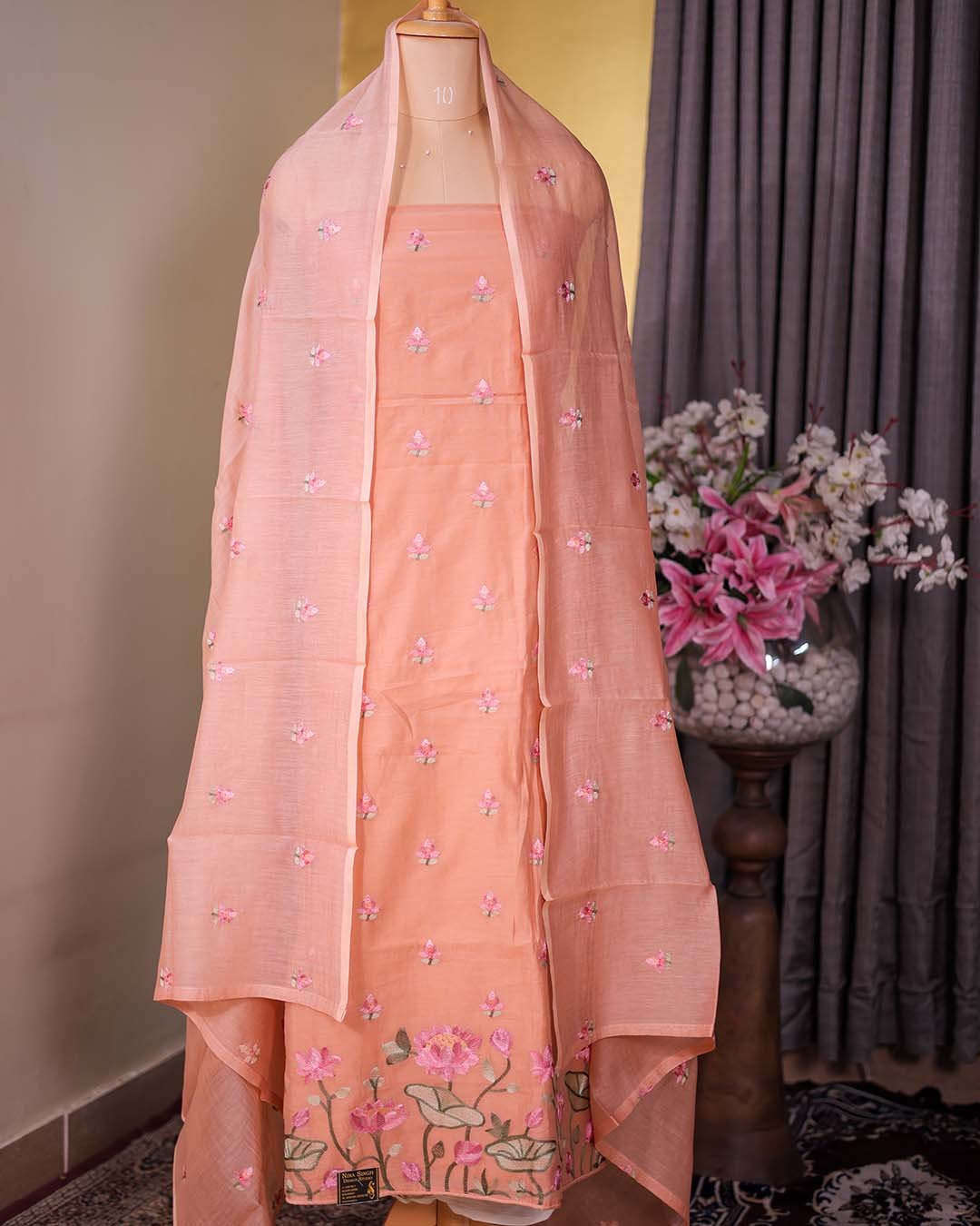 Peach Mal Chanderi Suit with Floral Bootis & Embroidered Hemline