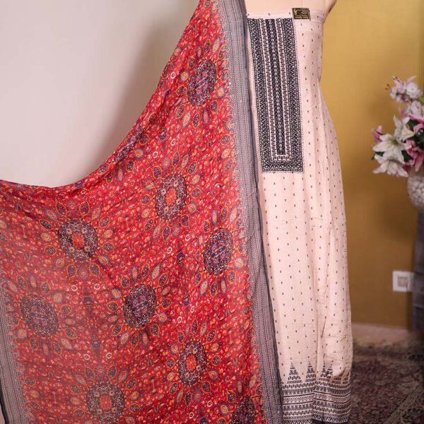 Beige Muslin Suit with Triangle Bootis & Beaded Neckline